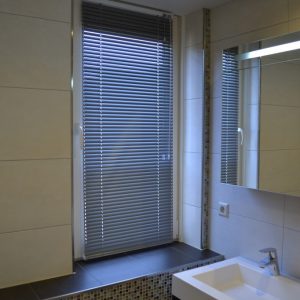 Vernieuwen badkamer met glasmozaïek